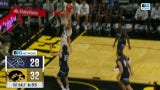 Brock Harding finds Owen Freeman under the basket for a strong two-handed slam to extend Iowa's lead over North Florida