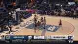 Wayne Bristol Jr. finishes a reverse layup to secure Georgetown's 69-67 win over Merrimack