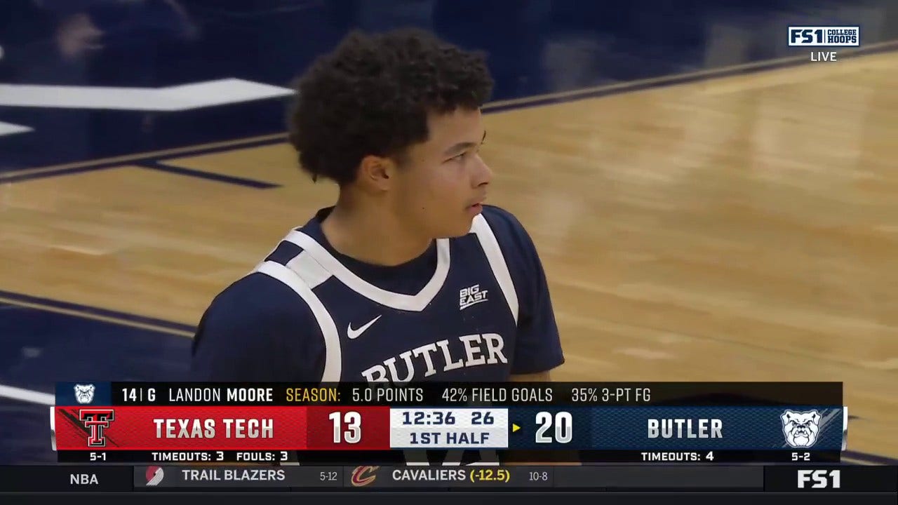 Landon Moore pump fakes and drains a 3-pointer, extending Butler's lead over Texas Tech