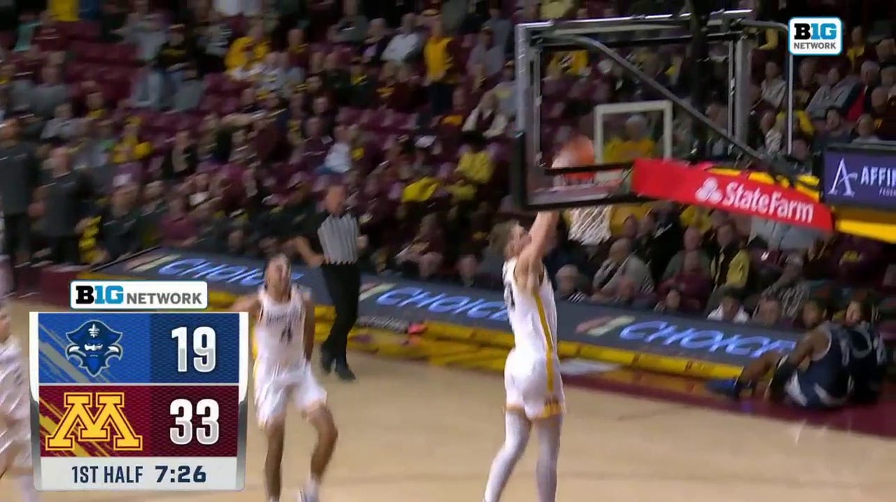Parker Fox gets out in transition for a strong slam dunk to extend Minnesota's lead over New Orelans