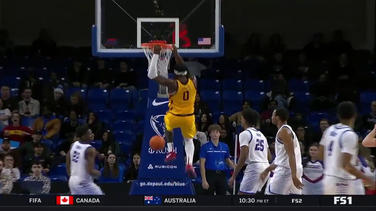 Tre King throws down a strong two-handed slam in transition to extend Iowa State's lead over DePaul