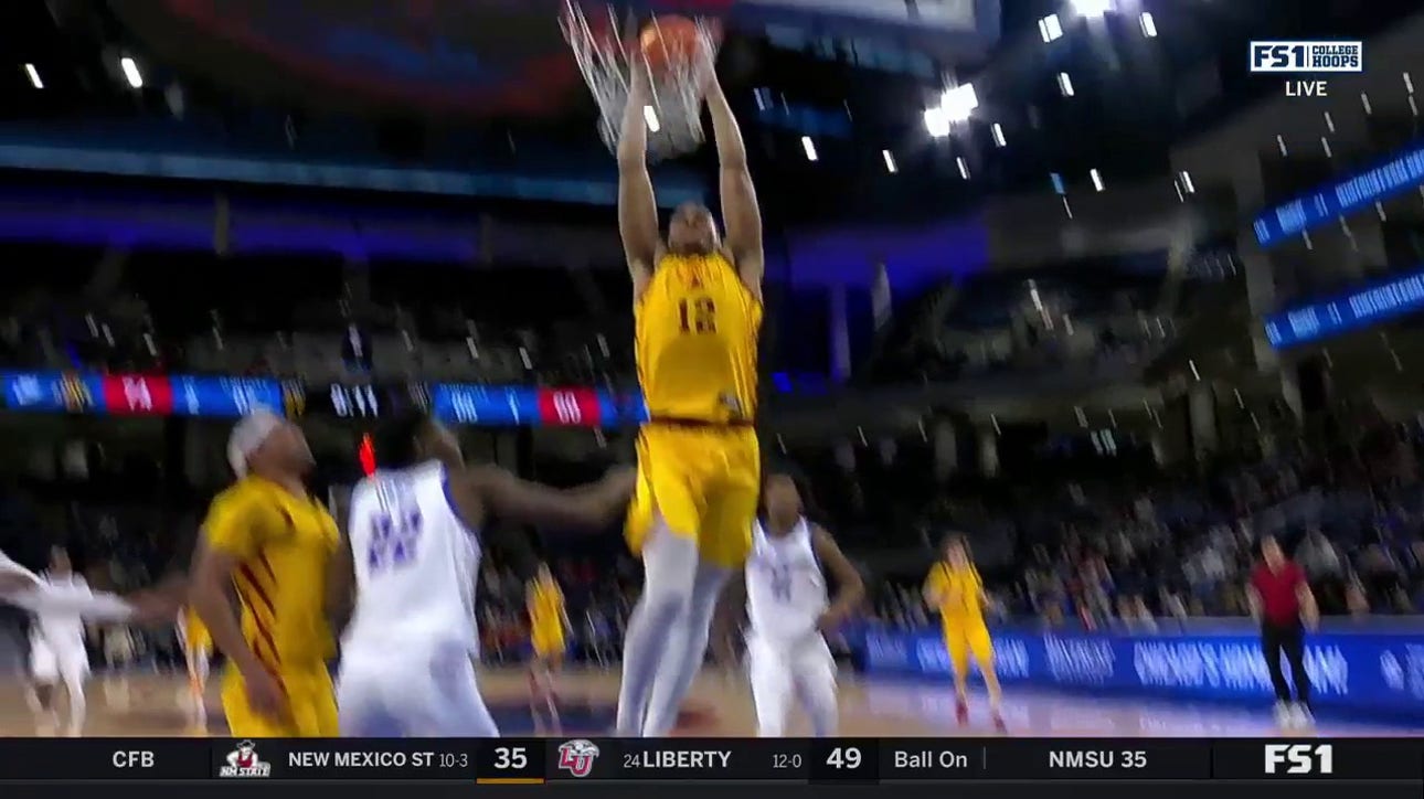 Tamin Lipsey intercepts the pass, then throws it ahead to Robert Jones for the two-handed dunk to extend Iowa State's lead over DePaul