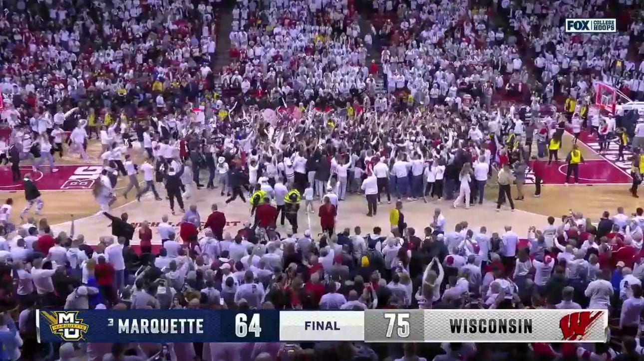 AJ Storr nails a baseline jumper as Wisconsin upsets Marquette