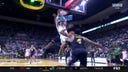 Oregon's Brennan Rigsby cuts inside for a MONSTER two-handed flush vs. Michigan