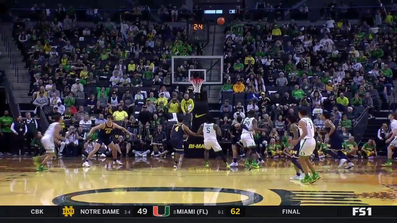 Jackson Shelstad drains a CLUTCH 3-pointer to seal Oregon's victory against Michigan