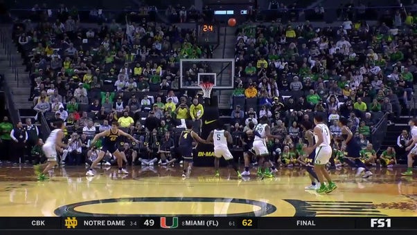 Jackson Shelstad drains a CLUTCH 3-pointer to seal Oregon's victory against Michigan