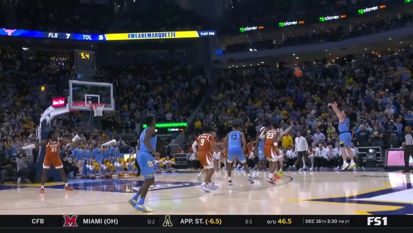 Tyler Kolek sinks a DEEP 3-pointer to extend Marquette's lead vs. Texas heading into the half