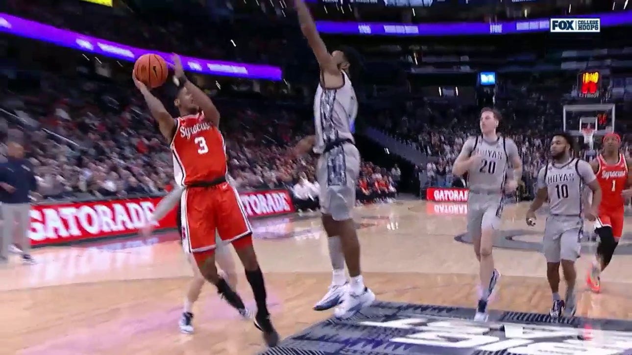Syracuse's Judah Mintz finishes strong through contact for the and-1 layup against Georgetown