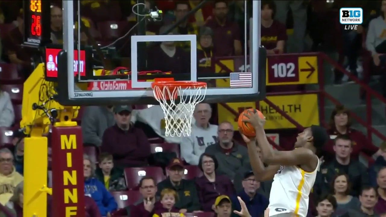 Minnesota's Pharrel Payne makes the block and finishes strong against FGCU