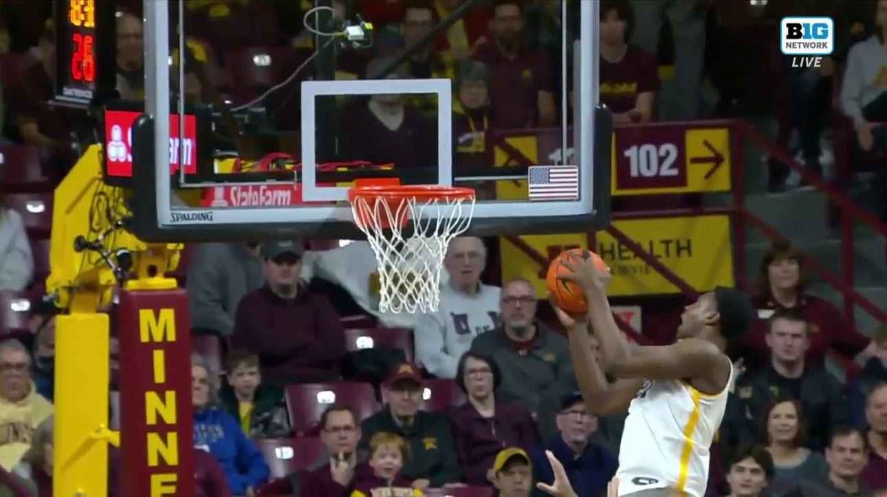 Minnesota's Pharrel Payne makes the block and finishes strong against FGCU