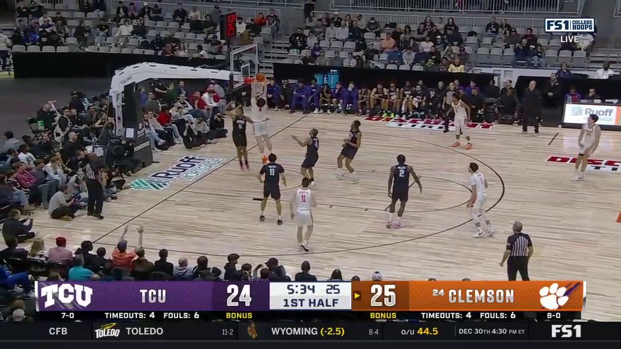 Clemson's Ian Schieffelin gets inside for the two-handed jam against TCU