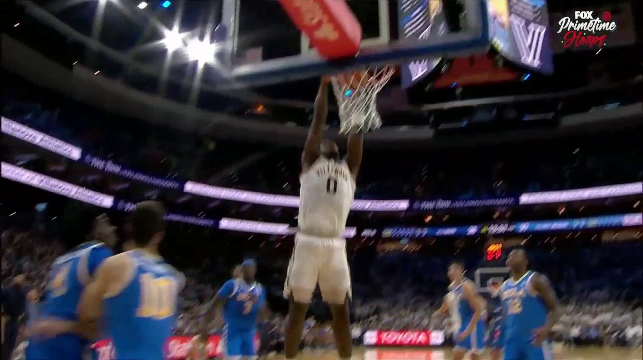 Villanova's TJ Bamba blows past UCLA's defense en route to a nasty jam