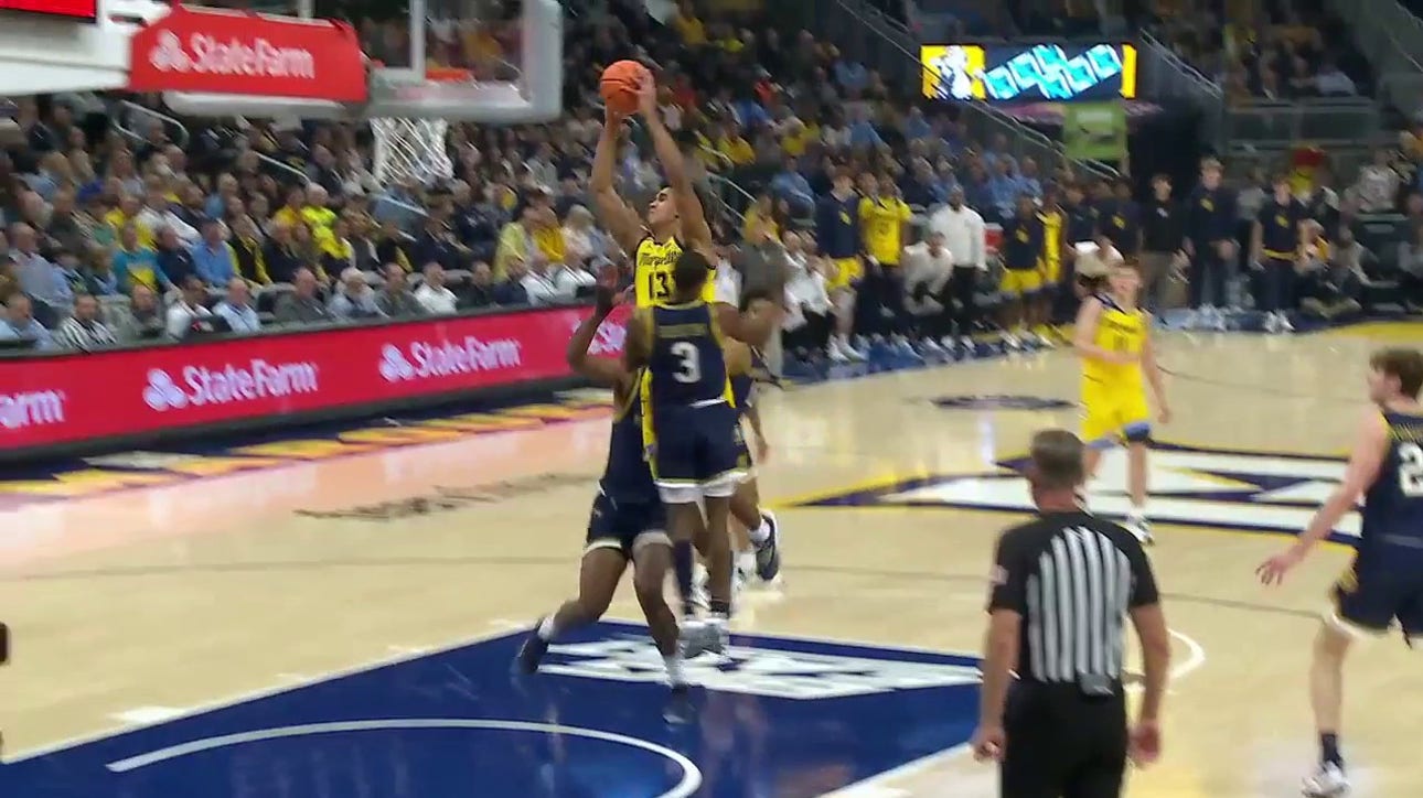 Oso Ighodaro goes coast-to-coast and throws down a POSTER jam early vs. Notre Dame