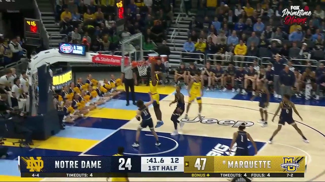 Marquette's Chase Ross throws down the two-handed slam to increase lead over Notre Dame