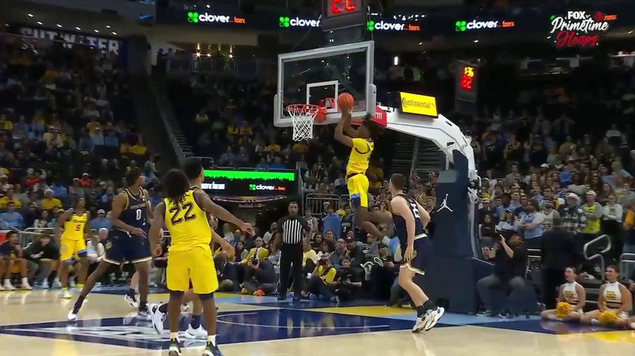 Marquette's Sean Jones connects with Al Amadou on a wild alley-oop jam to seal game vs. Notre Dame