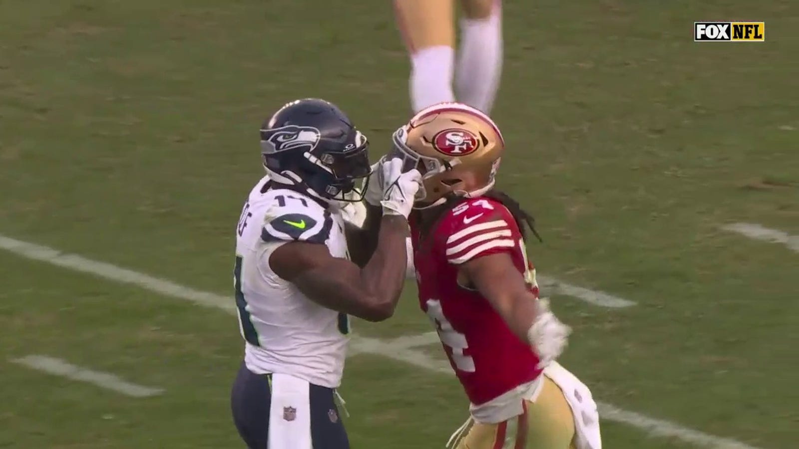 Seahawks' DK Metcalf gets ejected for slamming 49ers' Fred Warner to the ground