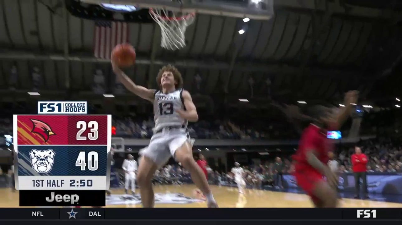 Finley Bizjack finishes the double-clutch layup in transition to extend Butler's lead over Saginaw Valley State