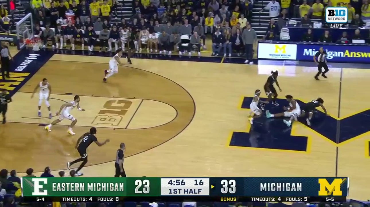 Michigan's Tarris Reed's incredible hustle leads to a Dug McDaniel bucket vs. Eastern Michigan 