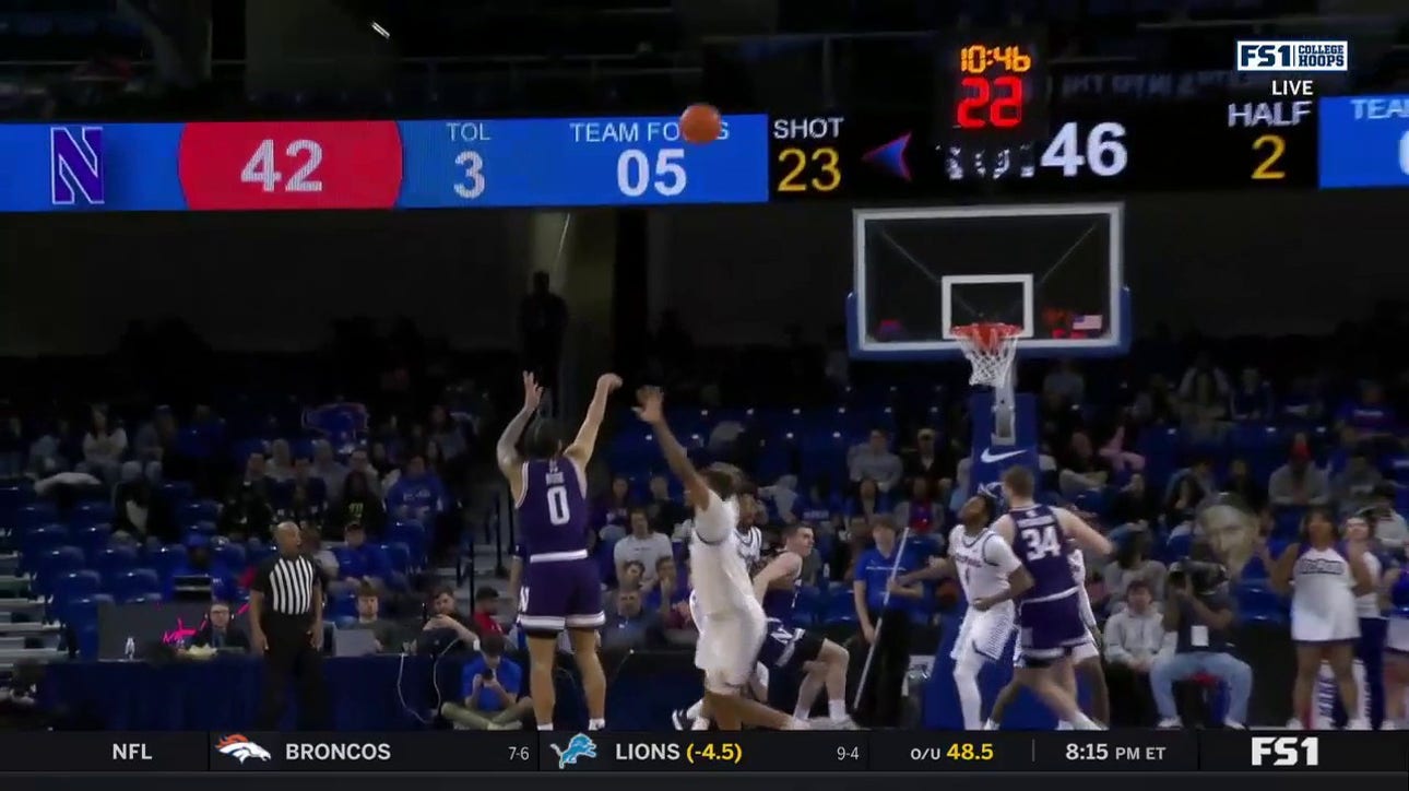Boo Buie hits a smooth step-back 3-pointer to extend Northwestern's lead over DePaul