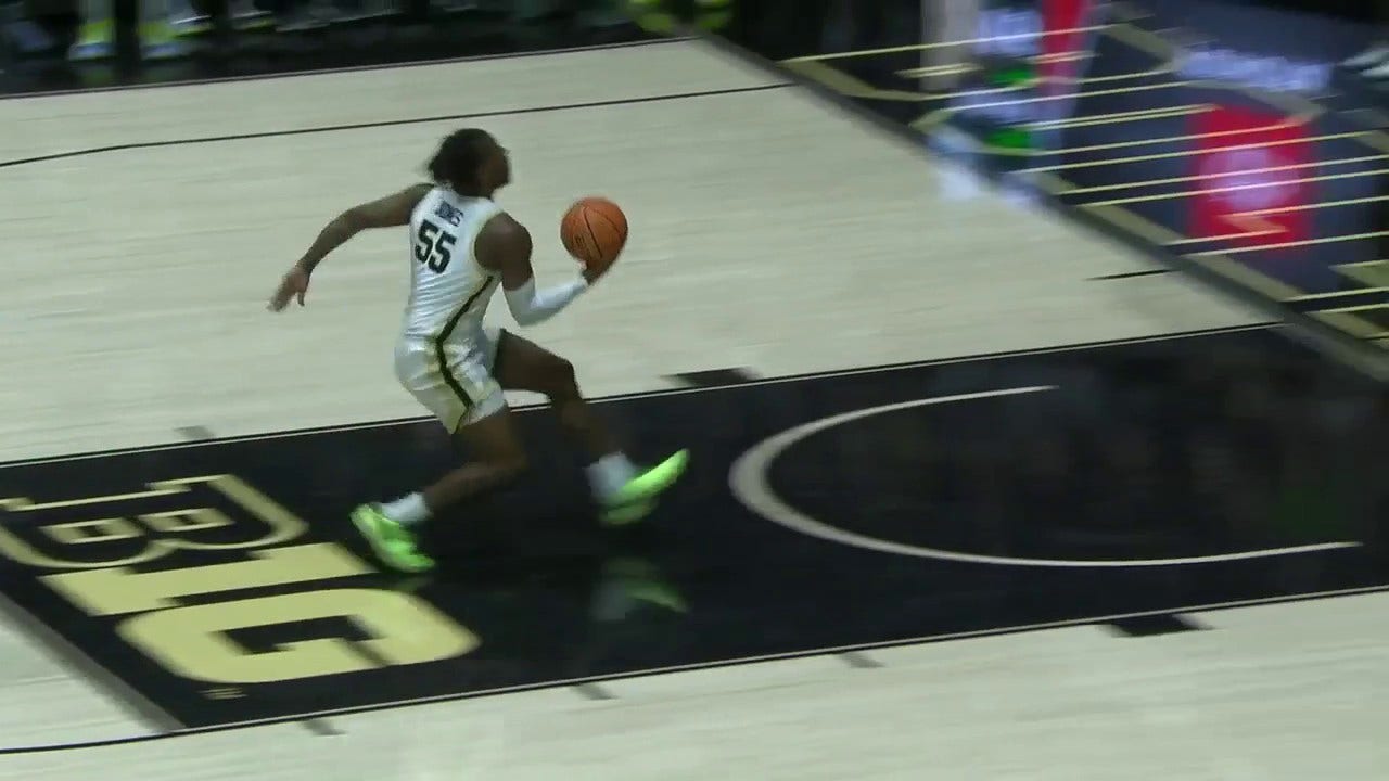 Lance Jones delivers a one-handed jam to extend Purdue's lead over Jacksonville