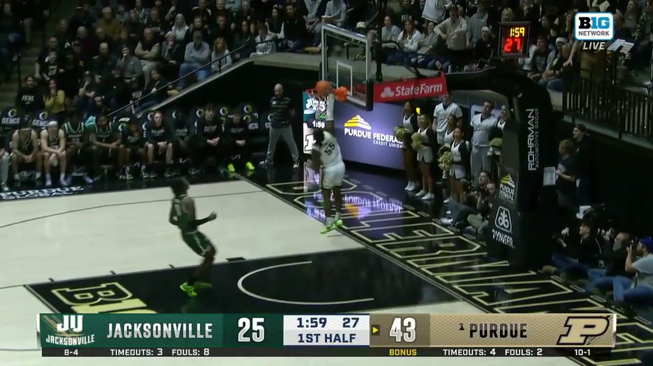 Purdue's Lance Jones makes the steal and throws down a wicked one-handed slam