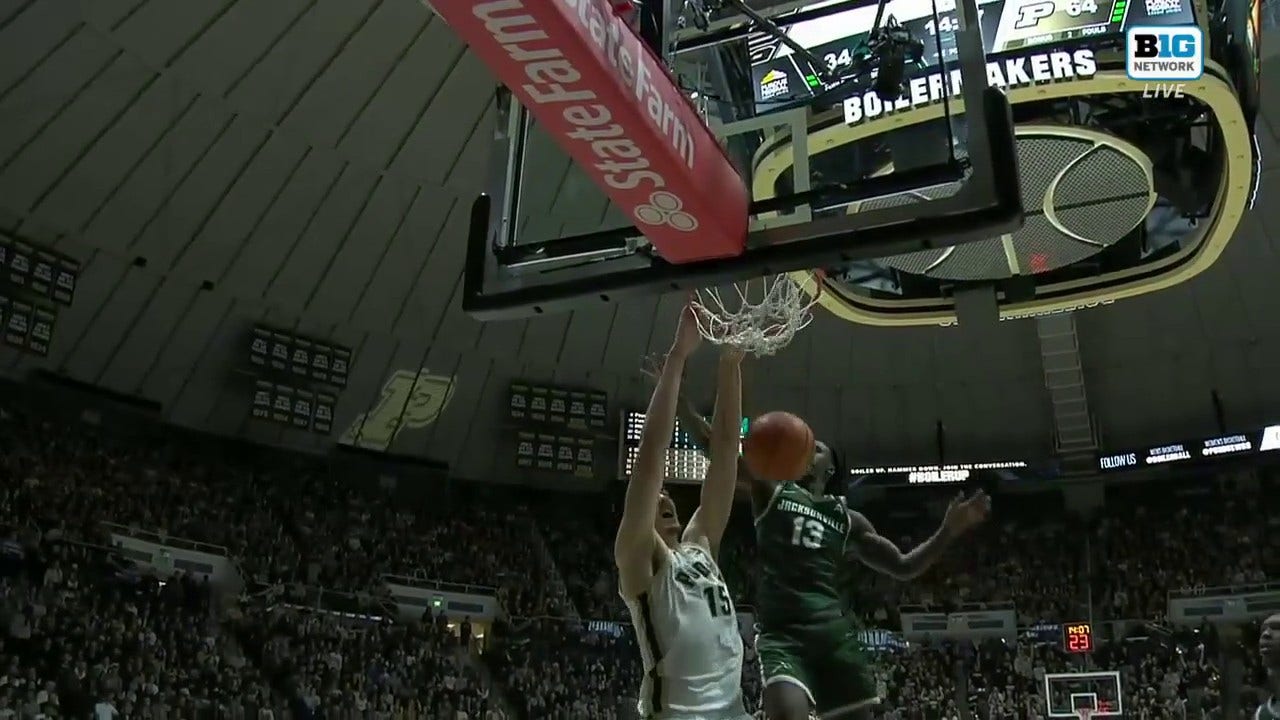 Camden Heide finds Zach Edey for an alley-oop to extend Purdue's lead over Jacksonville