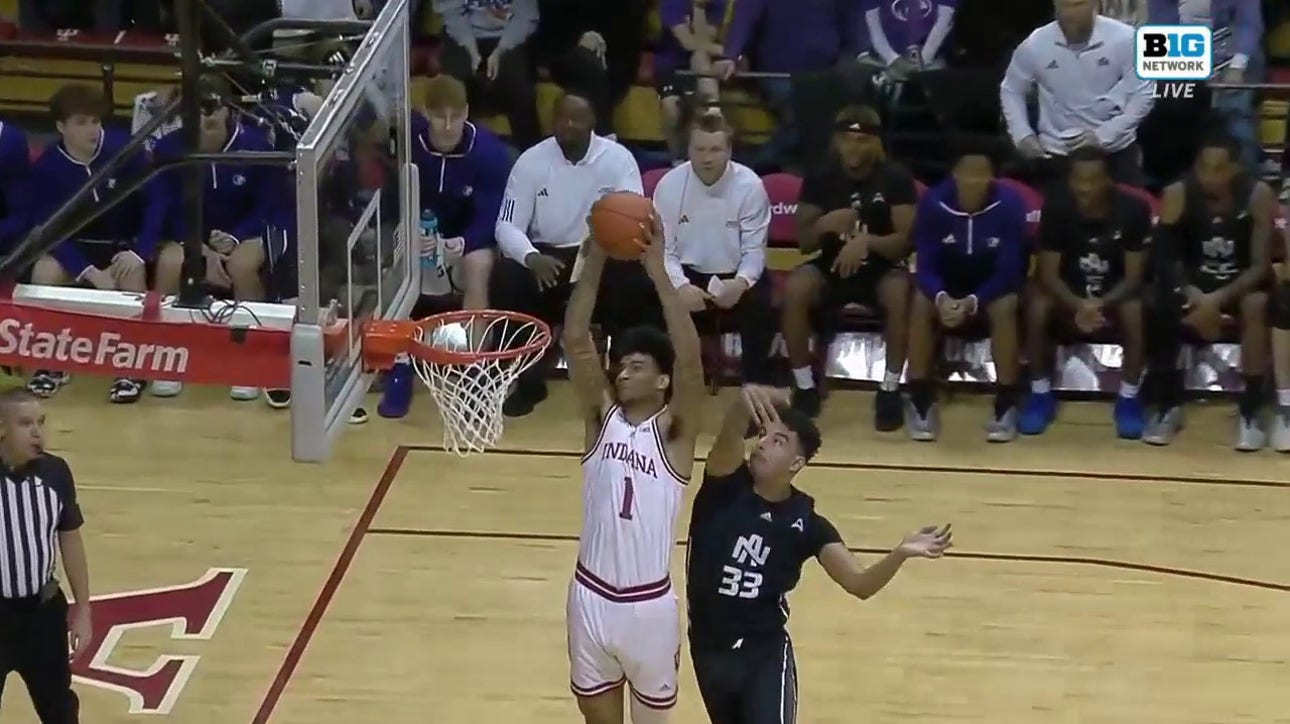 CJ Gunn finds Kel'el Ware for the strong two-haned alley-oop to increase Indiana's lead over North Alabama