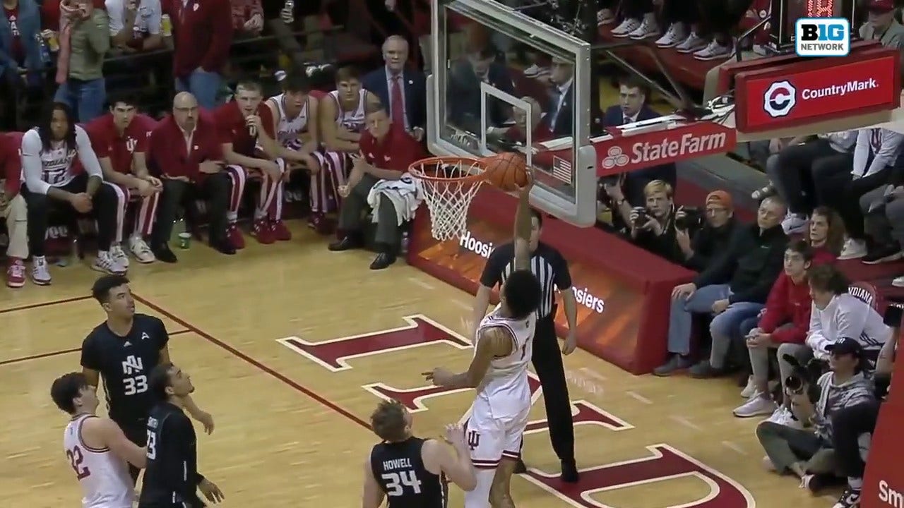 Trey Galloway tosses a no-look alley-oop to Kel'el Ware for the one-handed jam to extend Indiana's lead over North Alabama