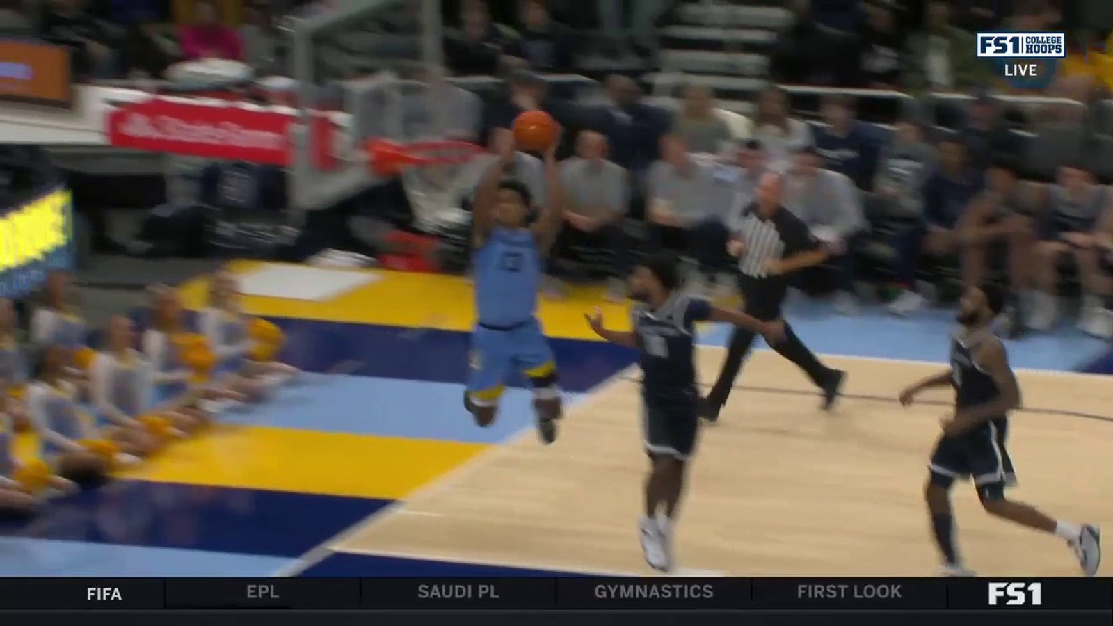 Tyler Kolek lobs it to Oso Ighodaro for a strong two-handed alley-oop to extend Marquette's lead over Georgetown