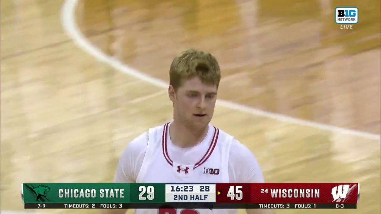 Wisconsin's Steven Crowl throws down a powerful two-handed dunk against Chicago State