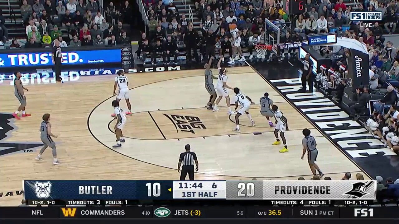 Butler's Andre Screen finishes a tough and-1 vs. Providence