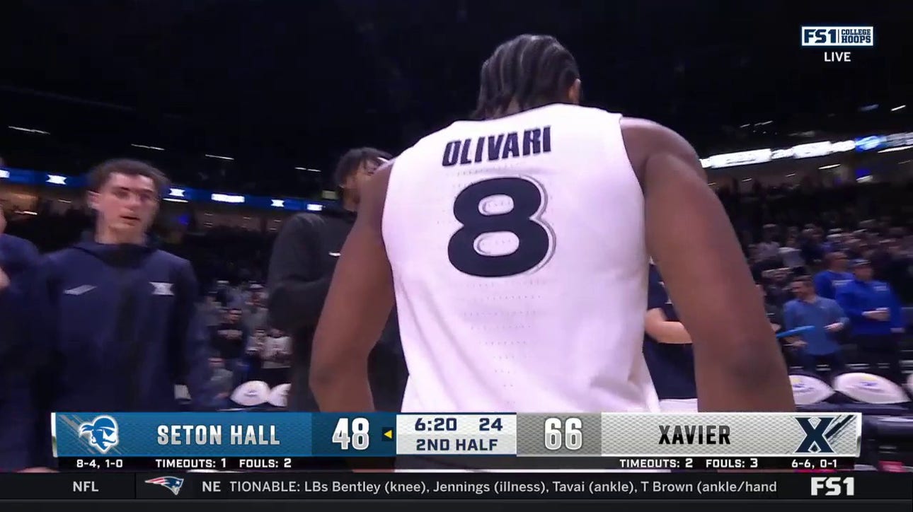 Quincy Olivari nails a 3-pointer to seal Xavier's dominant 74-54 victory over Seton Hall