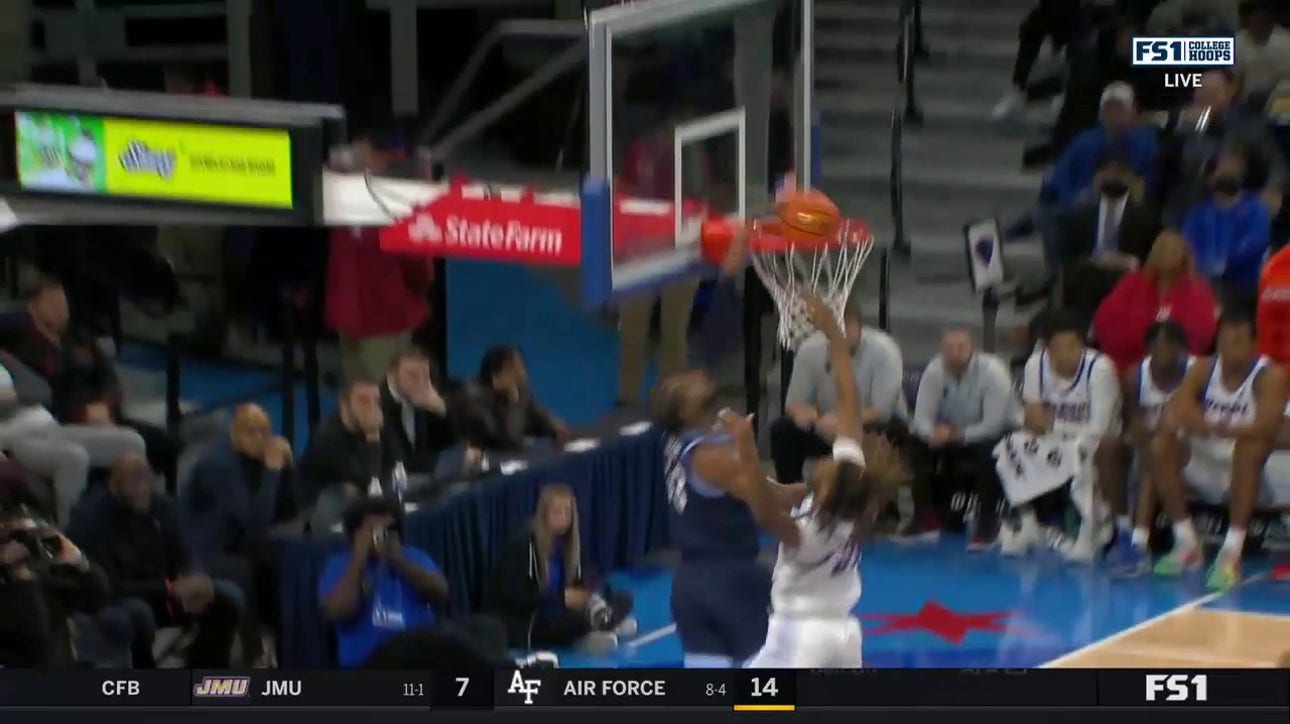 Eric Dixon throws down a NASTY one-handed and-1 dunk to extend Villanova's lead over DePaul