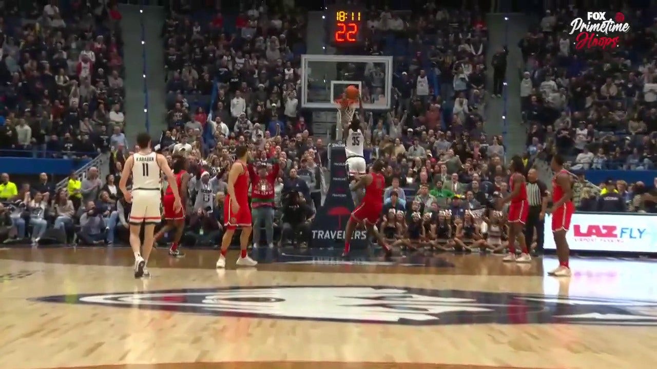 Samson Johnson cuts to the rim and converts on a TOUGH jam to help UConn tie the game vs. St. John's