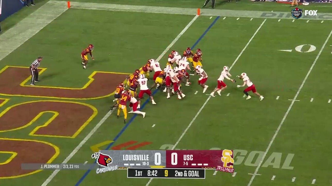 Isaac Guerendo punches it in from a yard out, giving Louisville a 7-0 lead vs. USC