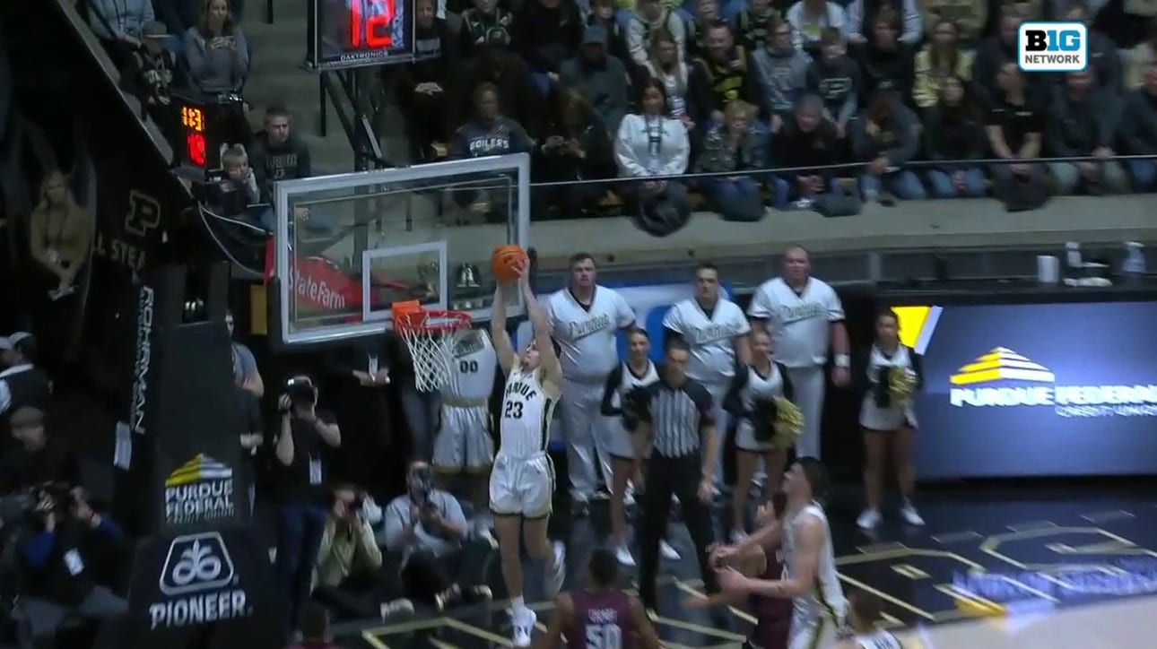 Purdue's Camden Heide sneaks up the baseline and throws down a wicked alley-oop jam