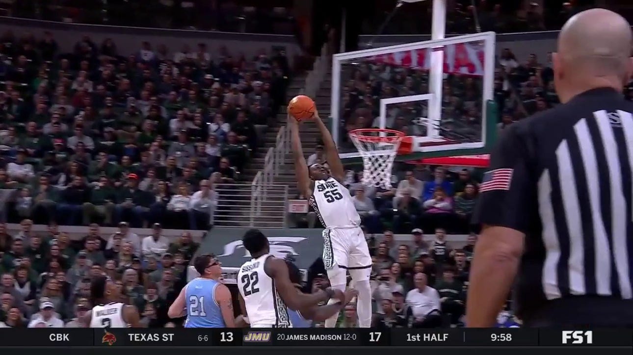 Coen Carr rises for the strong two-handed alley-oop to extend Michigan State's lead over Indiana State