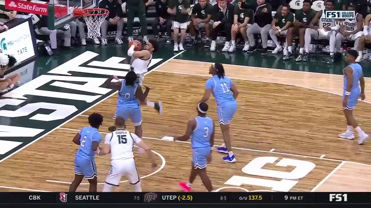 Michigan State's Malik Hall absorbs the contact and finishes the and-1 layup to even the score against Indiana State