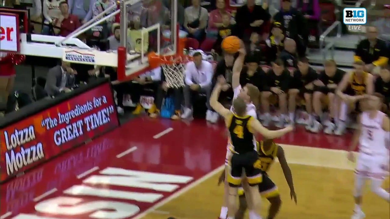 Wisconsin's Steven Crowl puts down a hammer dunk vs. Iowa