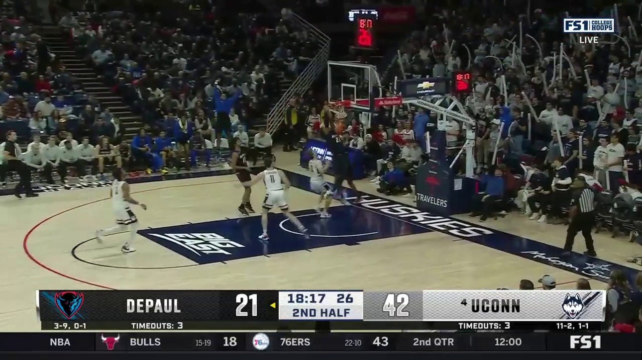 DePaul's Chico Carter Jr. delivers a beautiful behind-the-back pass to Da'Sean Nelson for the jam
