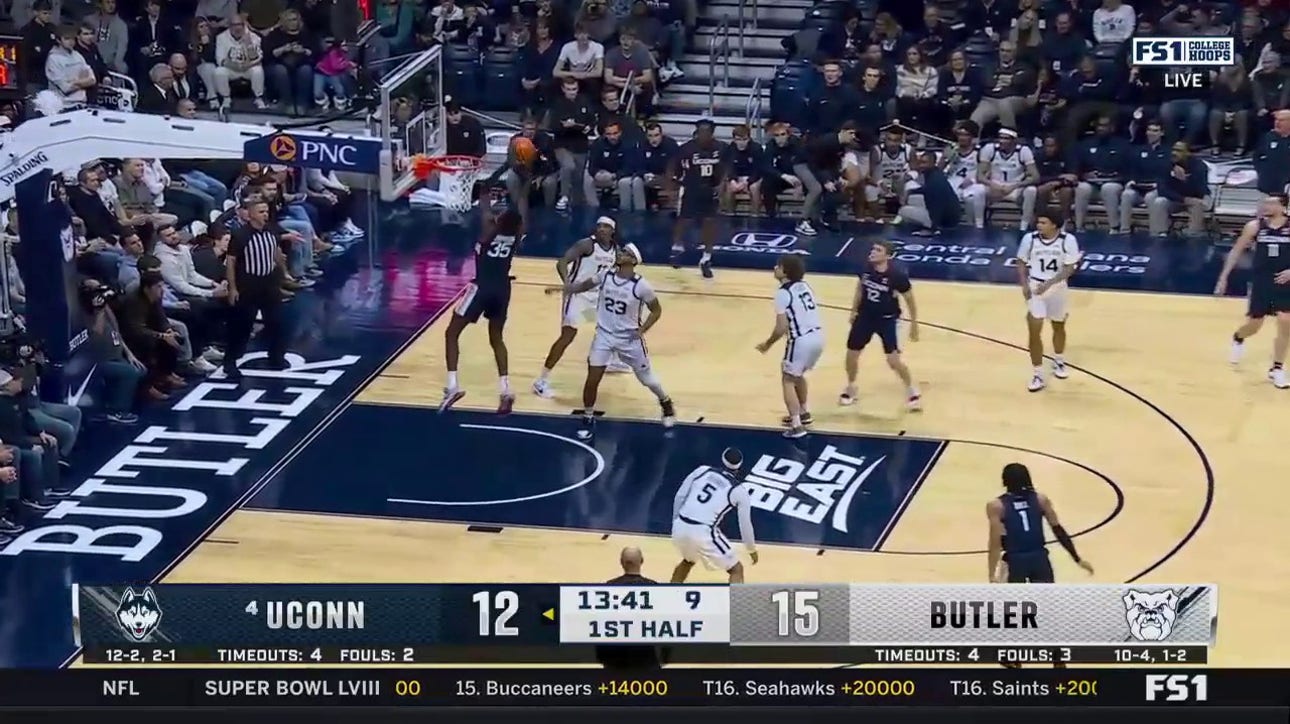 UConn's Samson Johnson rises for the MASSIVE alley-oop vs. Butler