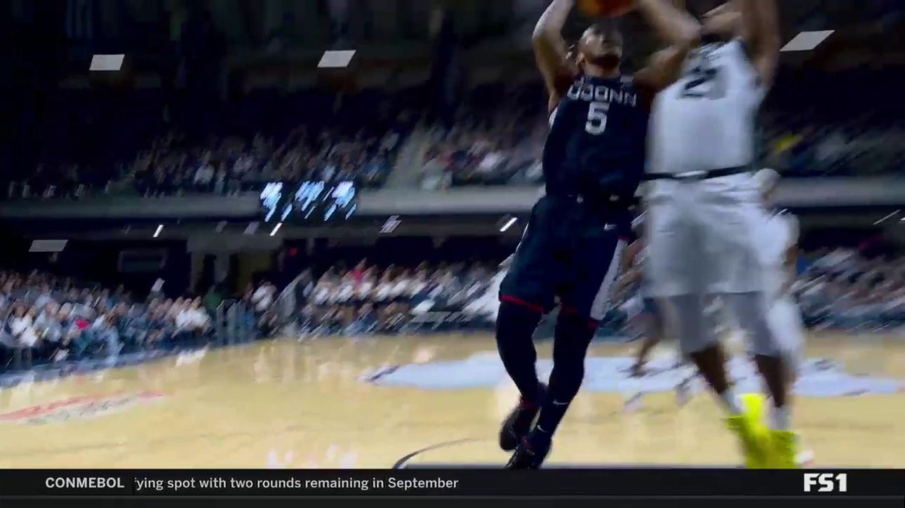 UConn's Stephon Castle finishes strong for an and-1 to trim Butler's lead