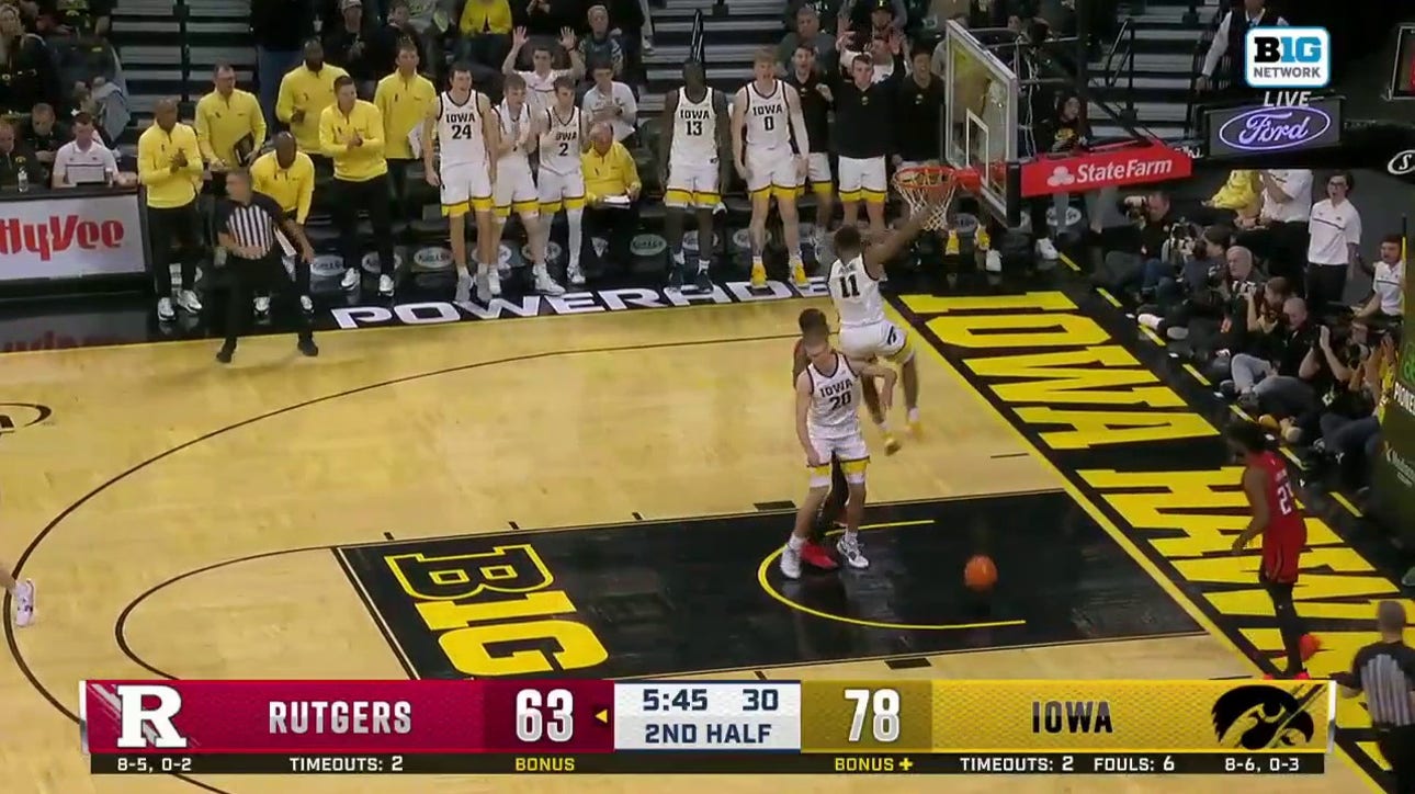 Tony Perkins comes up with the steal and throws down a one-handed flush to extend Iowa's lead over Rutgers