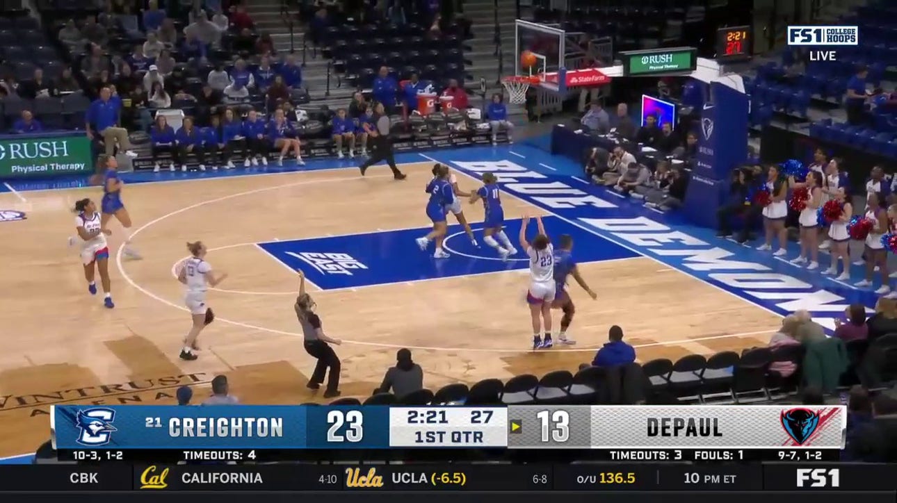 DePaul's Katlyn Gilbert steals the ball and passes ahead to Michelle Sidor for a 3-pointer to trim Creighton's lead