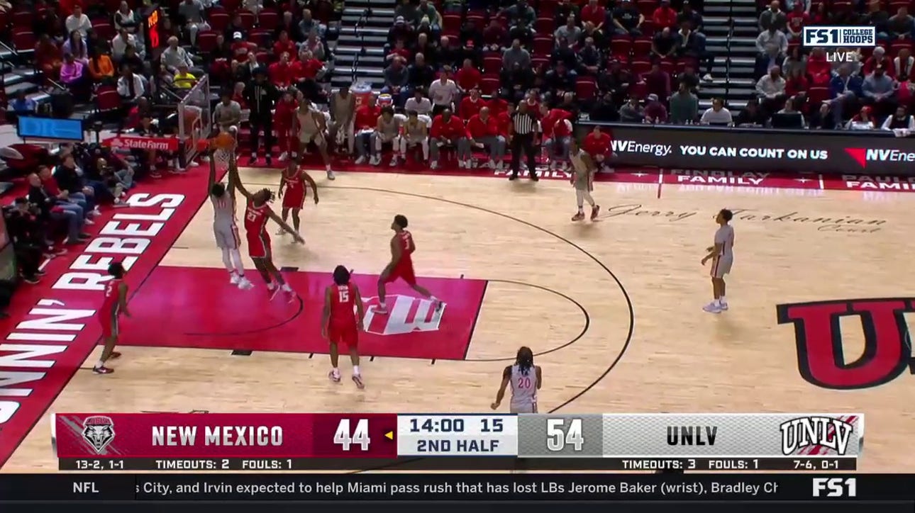 Kalib Boone throws down a dunk inside, extending UNLV's lead vs. New Mexico