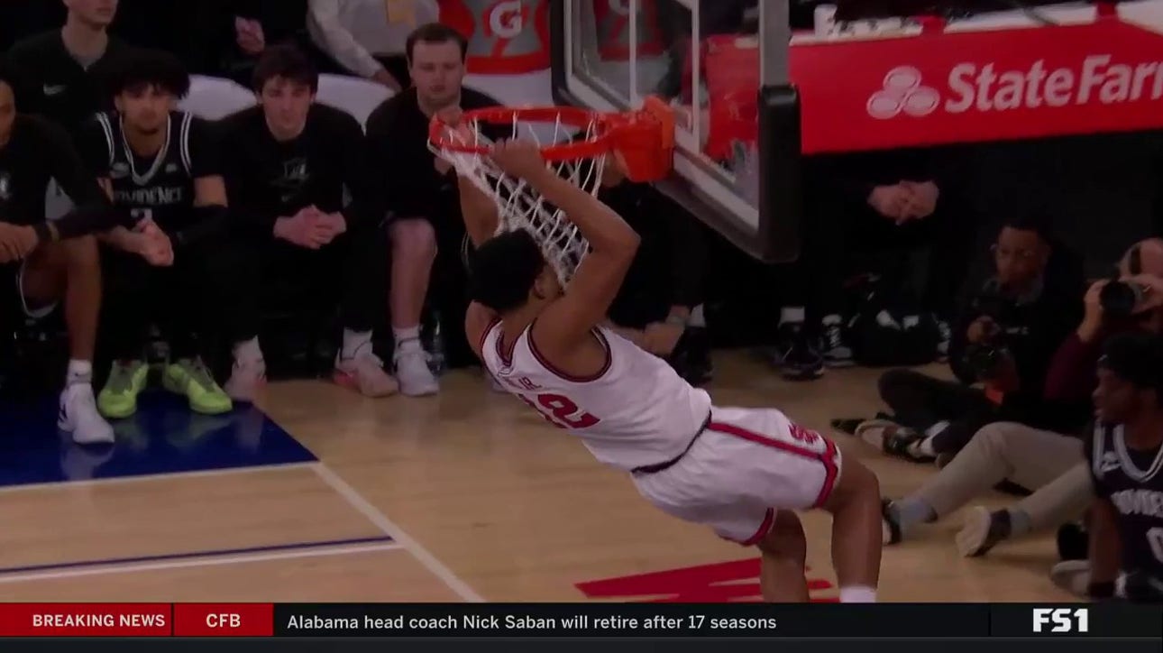 RJ Luis Jr. rises for the alley-oop in transition to extend St. John's lead over Providence