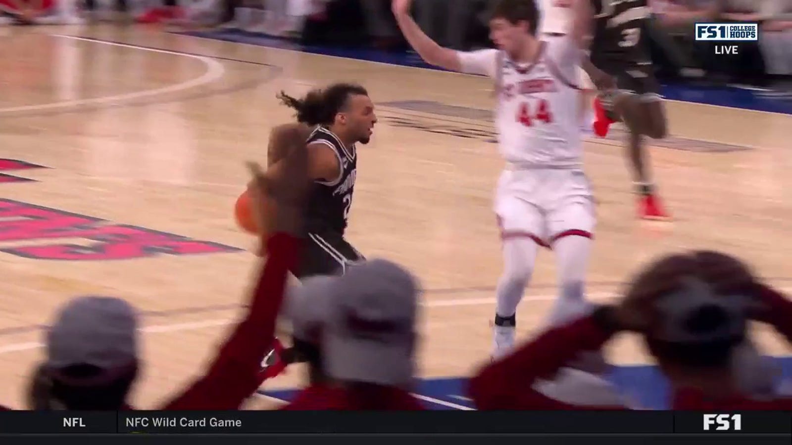 Providence's Devin Carter loses the defender and finishes the tough bucket vs. St. John's