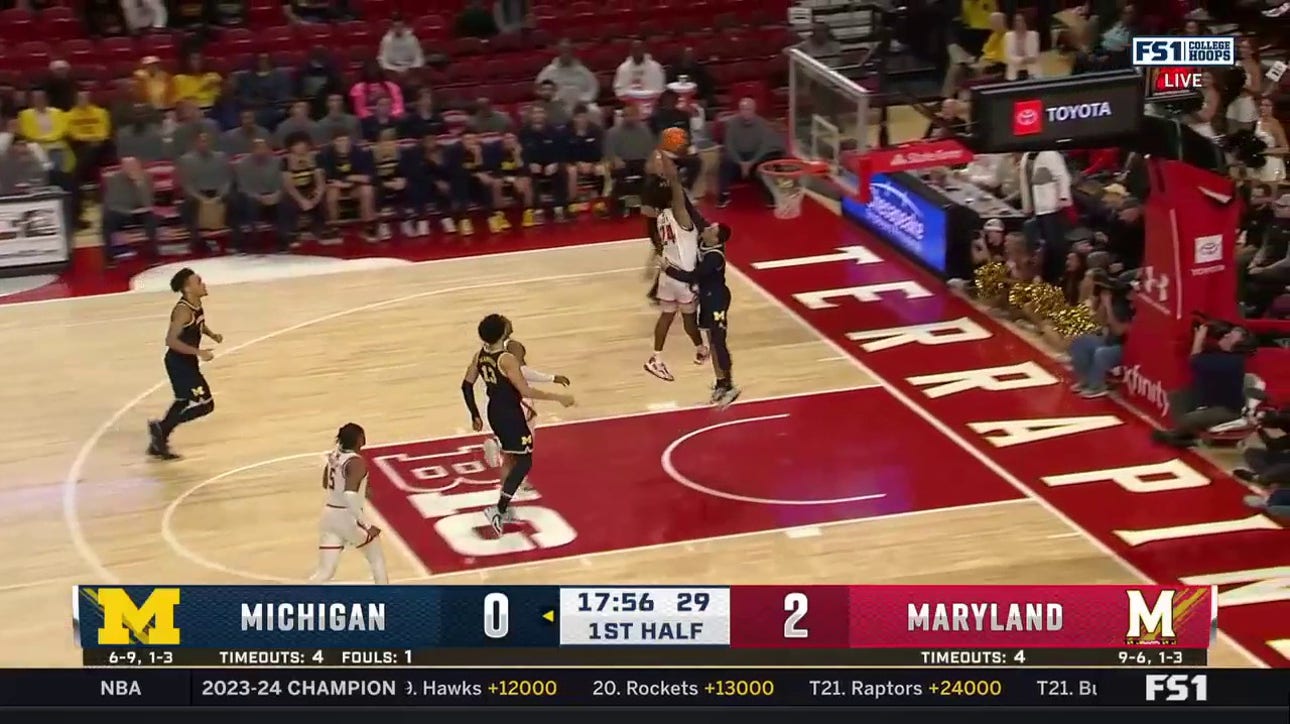 Maryland's Donta Scott HAMMERS down a one-handed tomahawk poster against Michigan