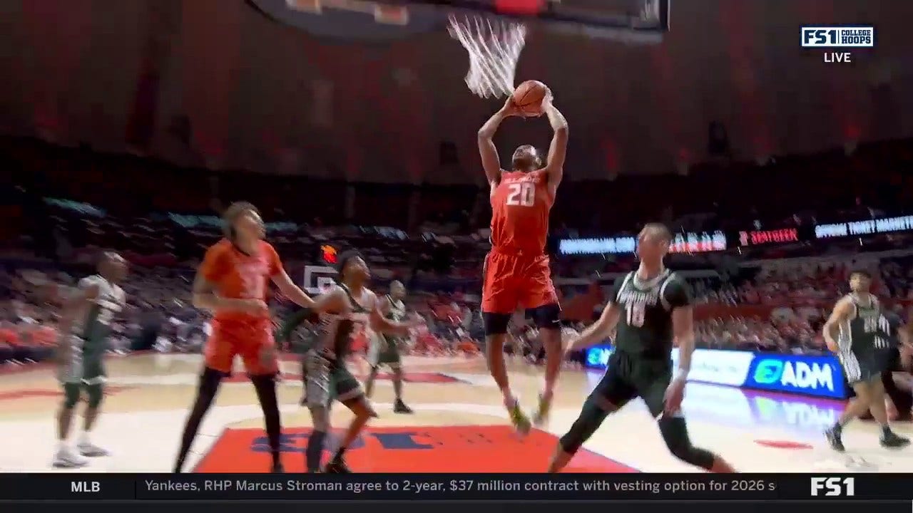 Ty Rodgers goes baseline for a strong two-handed dunk to extend Illinois' lead over Michigan State