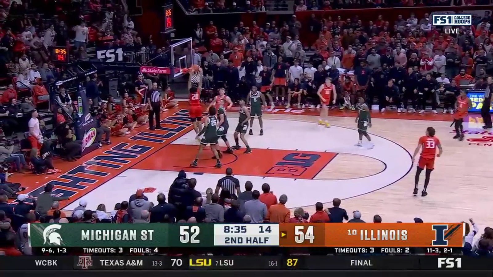 Marcus Domask drops a pass to Ty Rodgers for a strong two-handed slam to extend Illinois' lead over Michigan State 